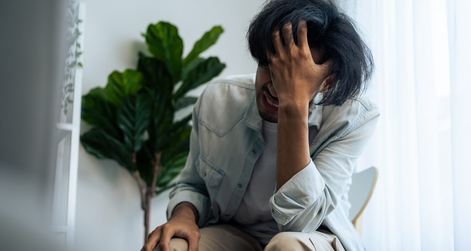 Person experiencing anxiety, representing mental health challenges treated at Abroi Psychiatry